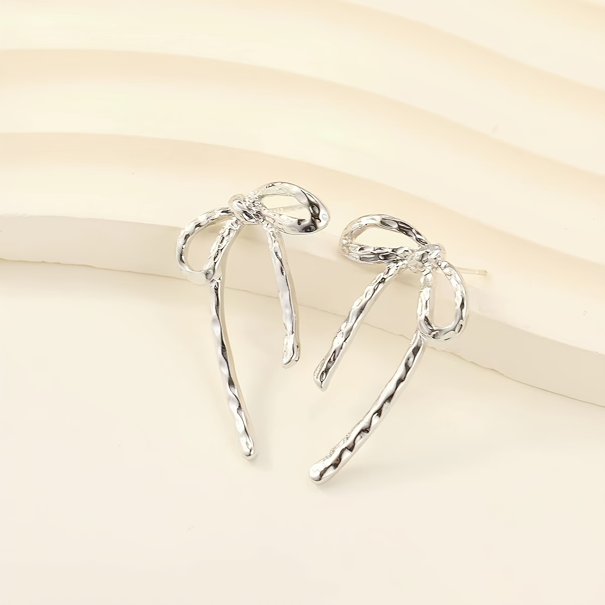 Hollow-Out Large Bow Stud Earrings